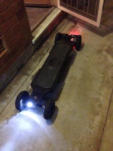 The insane electric skateboard my little brother showed up on.